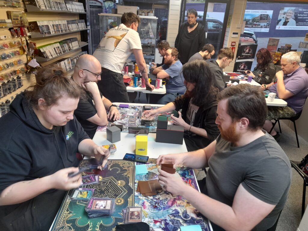 Max, the number one Guild of Games fan, working hard to decide which cards to play.