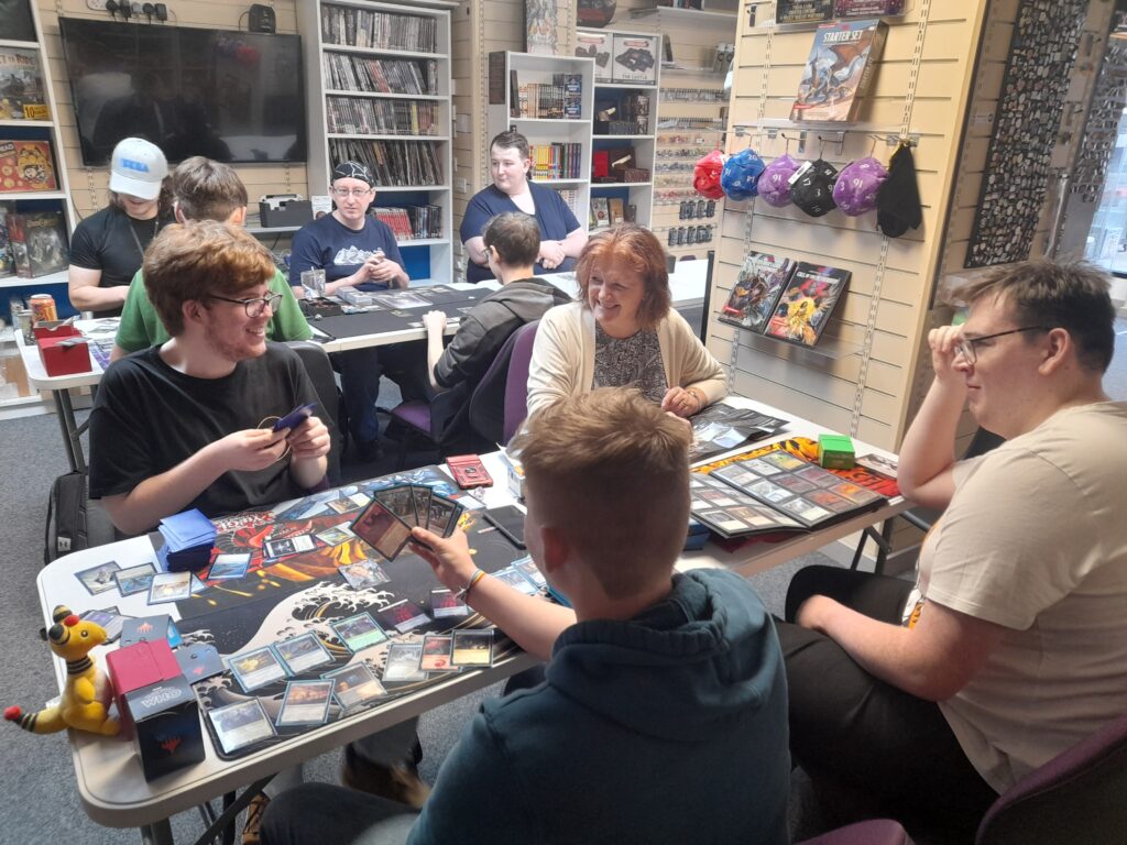 People playing Magic: The Gathering on a Friday evening at the Guild of Games