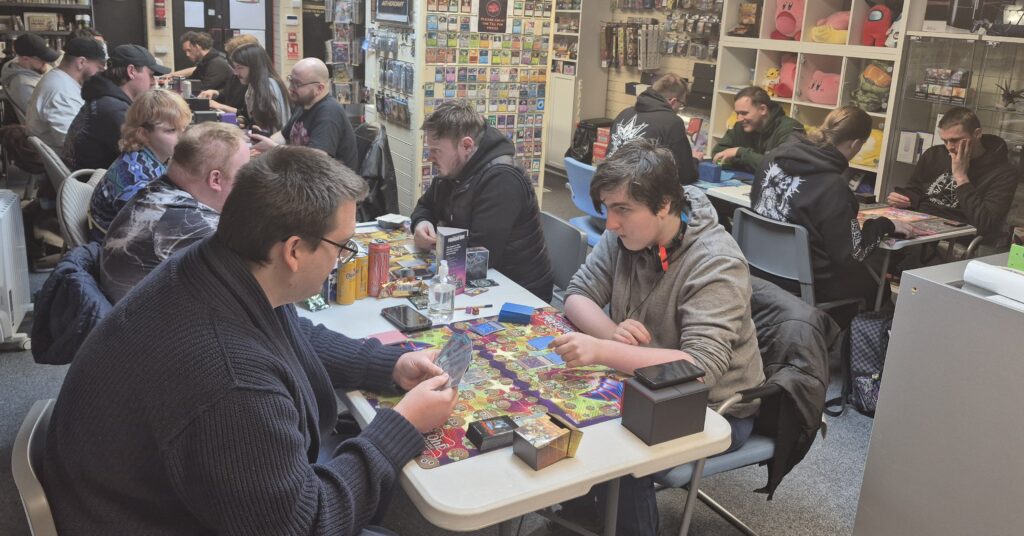 Kames, Kyle, Ben, Tom and 12 other players taking part in the Yu-Gi-Og OTS tournament at Guild of Games on 06/20/2025